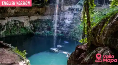 Cenote Zaci in central Valladolid with hanging roots and stone walls